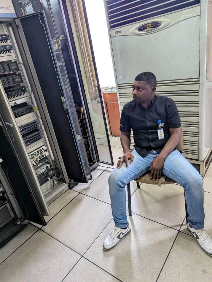 Experienced technology professionals examining advanced digital systems and engineering solutions